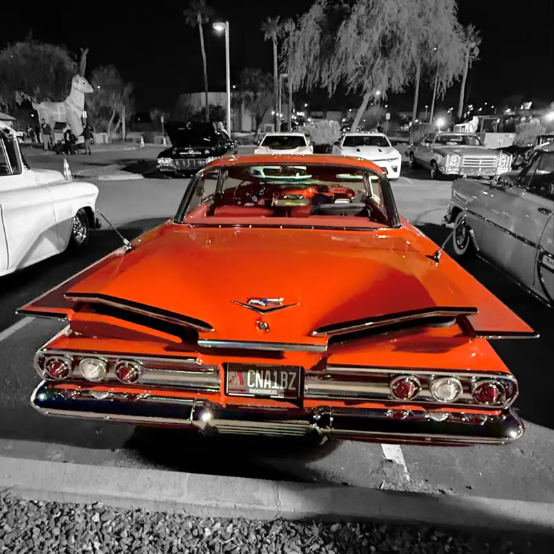 Orange classic lowrider on display